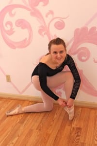 Dancer tying her ballet shoes at Catherine's Dance Studio, 170 English Landing Drive, Suite 111 Parkville, MO 64152