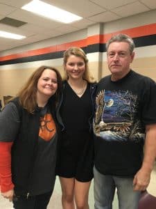 Mckenna Flaughter and her supportive parents